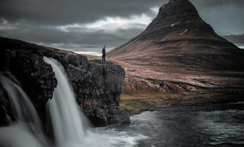 A stunning long exposure photograph of a waterfall in Iceland. Jumpstory.
