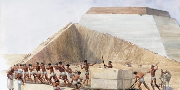 An artist's illustration showing the builders of the pyramids hauling massive blocks of stone up a ramp.