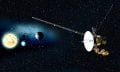 An artists rendering of the Voyager mission and the sun and planets in the background.