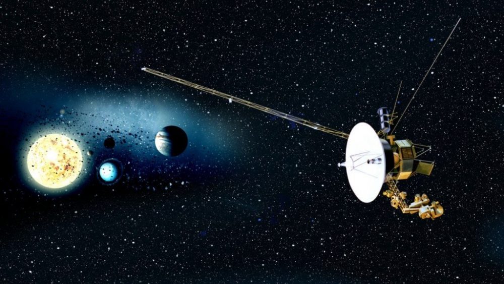 An artists rendering of the Voyager mission and the sun and planets in the background.