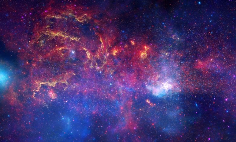 Data from NASA's Great Observatories has been combined to produce this unprecedented image of the central region of the Milky Way. Image Credit: X-ray: NASA/CXC/UMass/D. Wang et al.; Optical: NASA/ESA/STScI/D.Wang et al.; IR: NASA/JPL-Caltech/SSC/S.Stolovy.