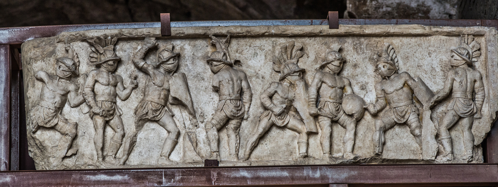 Relief presenting several gladiators during a fight.