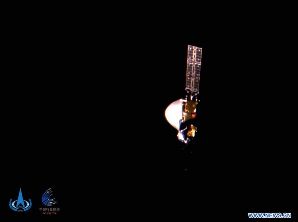 An image of the Tianwen 1 mission taken by the TW-1 Deployable Camera (T.D.C.). Image Credit: China National Space Administration.