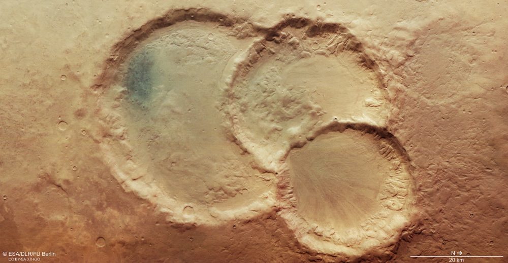 An image of a triple crater on Mars. Image Credit: ESA / DLR / FU Berlin / CC BY-SA 3.0 IGO.