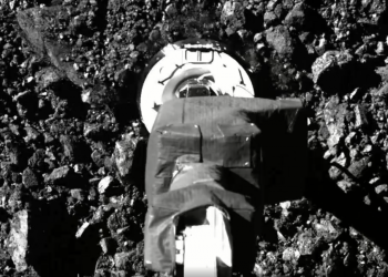 SamCam view of the sampling event on asteroid Bennu. Image Credit: NASA.