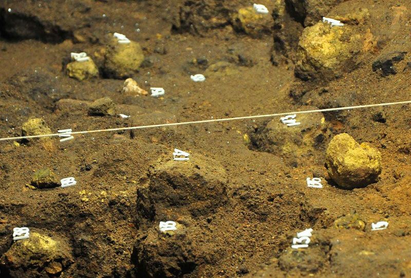 Some of the yellow spheres found in the Teotihuacan chamber. Credit: Huffpost 