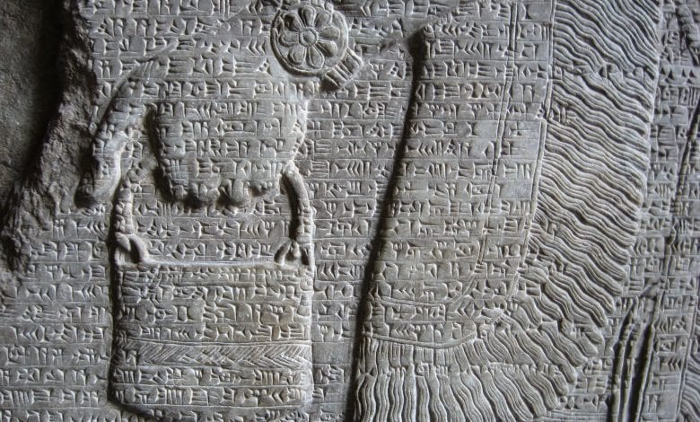 An ancient sumerian illustration of a deity carrying a "bag." Jumpstory.