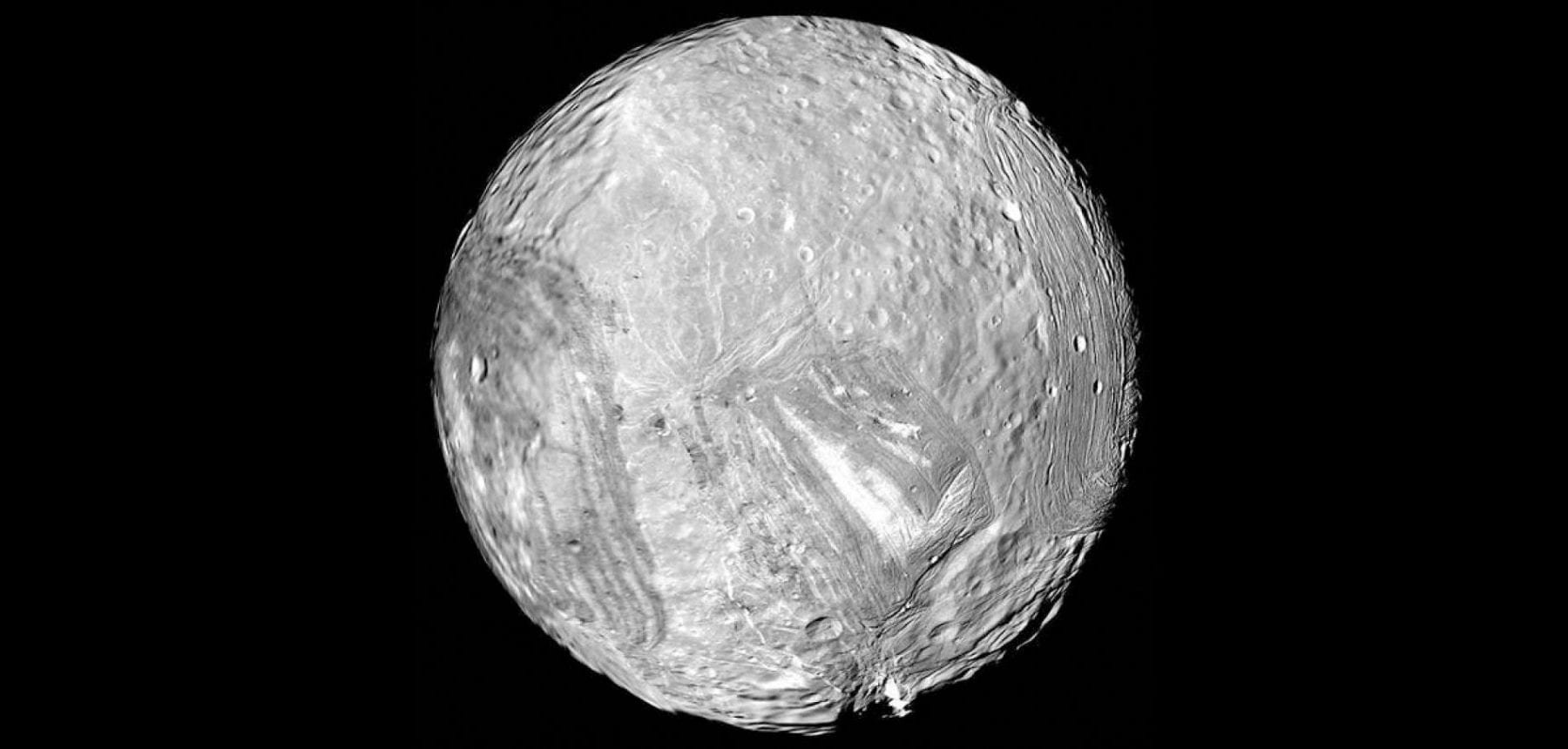 The strange moon Miranda with its damaged surface. Source: National Geographic