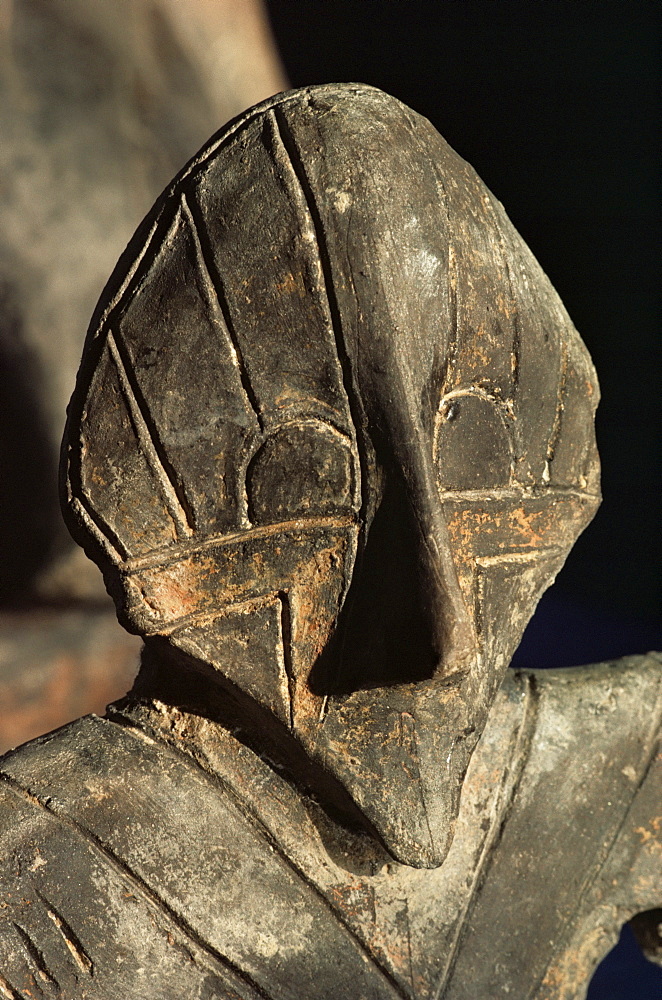 Here is a statuette that is clearly depicted wearing a mask. What could have influenced the ancient Vinca artists to depict beings in masks?