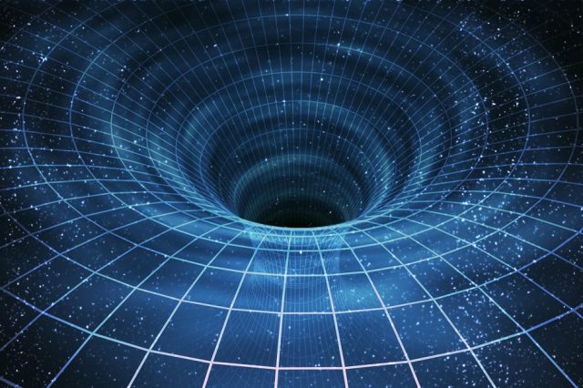 An Artistic impression of how a wormhole would look like. Do wormholes exist and could they hold the secret for time travel? Credit: Live Science