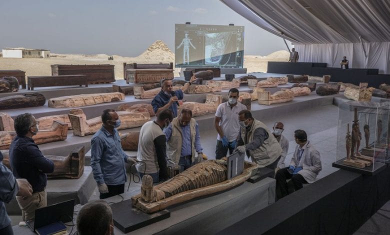 The exhibition of the latest discovery of ancient Egyptian sarcophagi and statuettes. Here, you can see the moment of the X-Ray scan performed in front of the guests. Credit: Associated Press