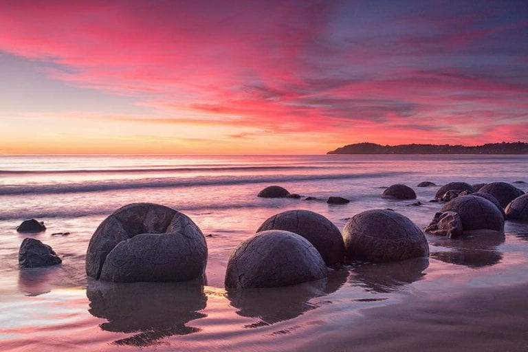 Mysterious stone spheres are located all over the world. The ones on the picture are from New Zealand. Credit: Megalithica.ru