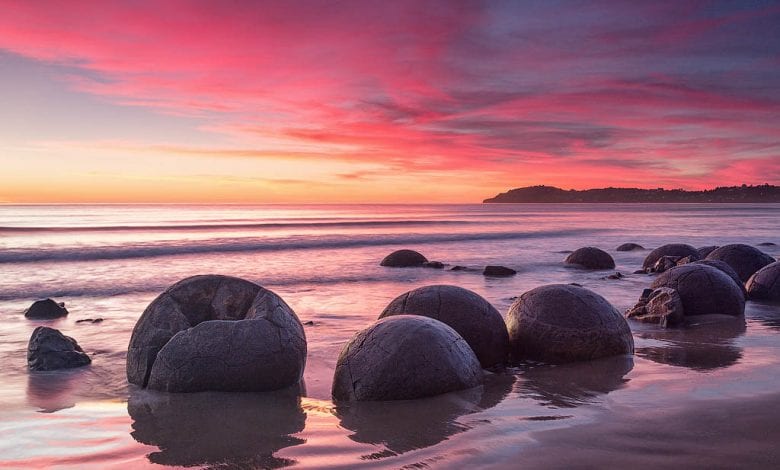 Mysterious stone spheres are located all over the world. The ones on the picture are from New Zealand. Credit: Megalithica.ru