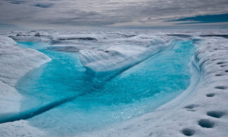 The breathtaking blue river on top of the Peterman glacier. Now, scientists believe they have found a "Dark River" below the glacier which could be a massive discovery, if confirmed. Credit: Lucas Laursen