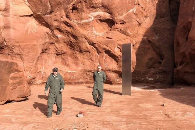 The mysterious monolith in the Utah desert and two of the crew members who discovered it. Credit: Utah Department of Public Safety