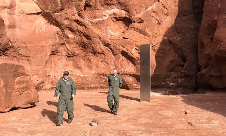 The mysterious monolith in the Utah desert and two of the crew members who discovered it. Credit: Utah Department of Public Safety
