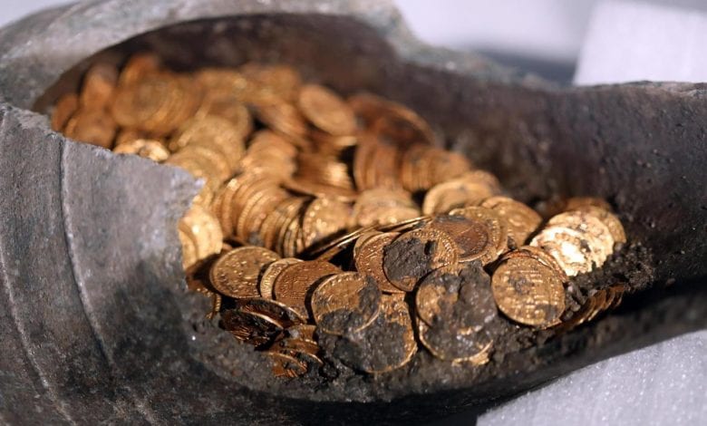 The majority of the coins were in pristine condition, protected by the sealed amphora. Credit: Italian Ministry of Culture