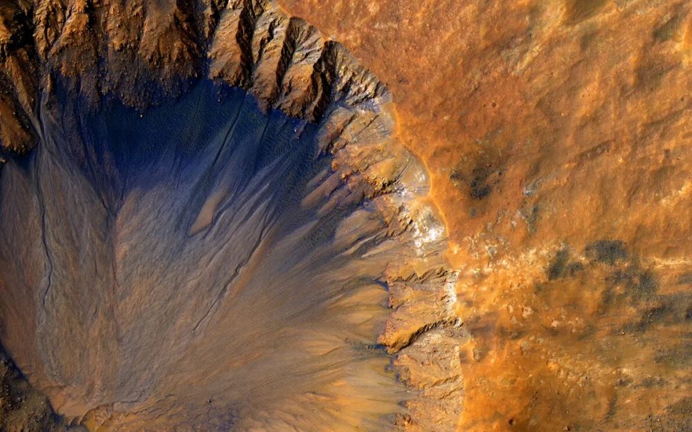 A crater near Sirenum Fossae. Credit: NASA