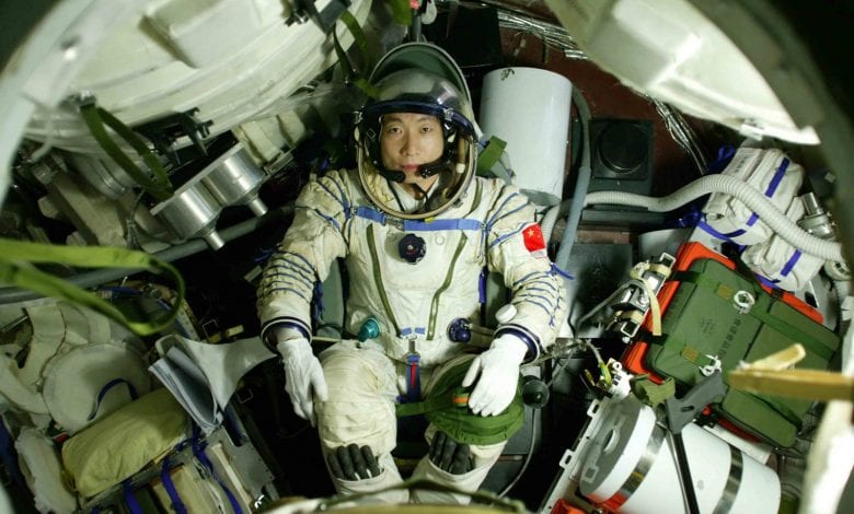 Astronaut Yang Liwei aboard the Shenzhou 5 spacecraft during his mission which was interrupted by the weird knocking sound. Credit: China.org.cn