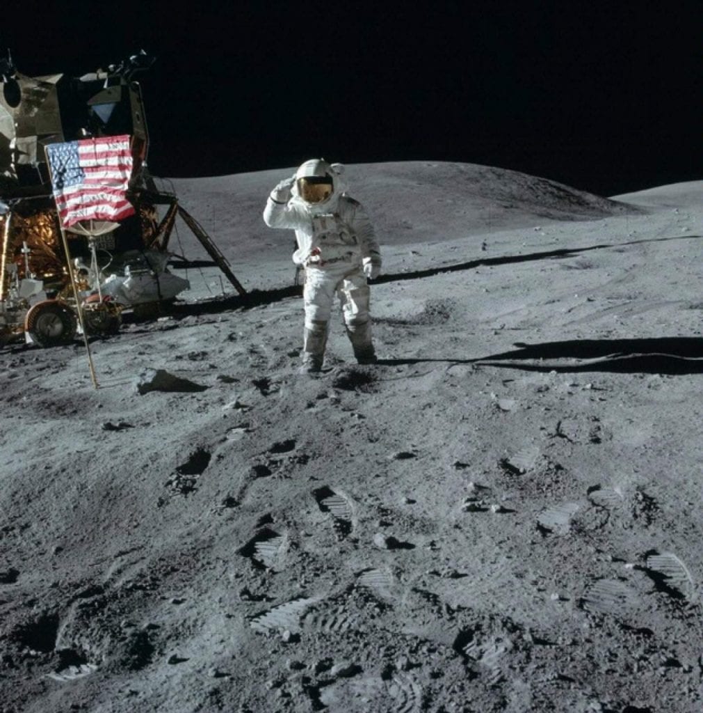 Lunar Module Pilot Charles Duke from Apollo 16 as he salutes the American flag. Credit: Smithsonian National Air and Space Museum / NASA