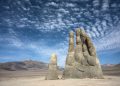The massive sculpture in the middle of the Chilean desert respectively called the Hand of the Desert. Credit: DepositPhotos