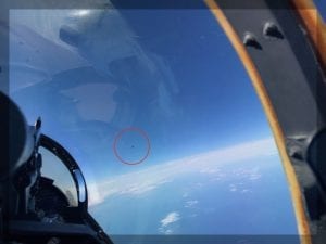 This image, snapped by a US Navy Pilot, shows the UFO circled in red. Image Credit: The Debrief.