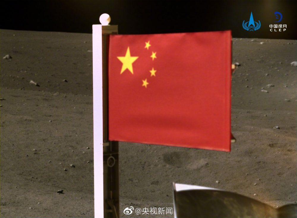A photograph from the Chang'e 5 lander-ascender of the Chinese flag on the Moon. Credit: CNSA/CLEP