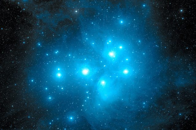The Pleiades Star Cluster, subject of countless myths and legends from time immemorial. Credit: Caltech, Palomar Observatory, Digitized Sky Survey