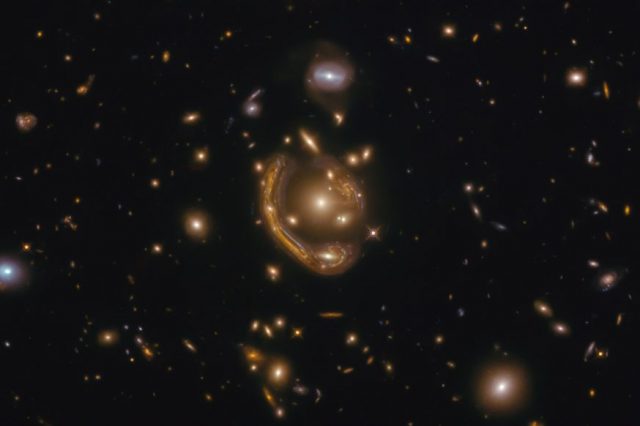 We are fortunate to see yet another one of Hubble's spectacular images of rare cosmic events, this time of the largest Einstein Ring known to science. Credit: ESA/Hubble & NASA, S. Jha; Acknowledgment: L. Shatz