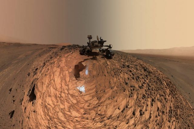 A low-angle "selfie" by the Curiosity Mars rover from one of the sample collection missions in the Gale Crater. Credit: NASA/JPL-Caltech/MSSS