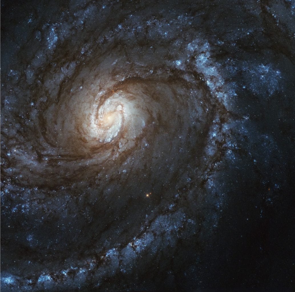 An image of spiral galaxy M100 by Hubble's Wide Field Camera 3 which was installed in 2009 during the last servicing mission. Credit: NASA, ESA, and Judy Schmidt