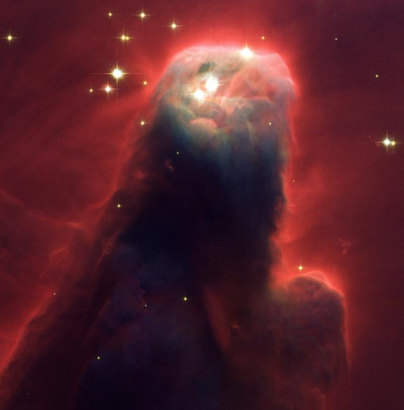 The Star-Forming Pillar of Gas and Dust of the Cone Nebula. Credit: NASA, H. Ford (JHU), G. Illingworth (UCSC/LO)
