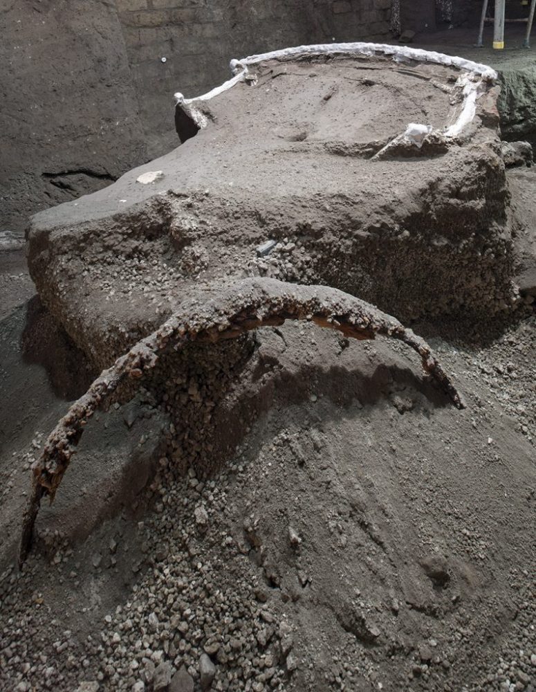 Most of the ancient Roman chariot including the wheels have not yet been fully excavated and cleaned. Credit: Luigi Spina / Parco Archeologico di Pompei