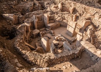Why the origins of civilization might lie in a forgotten Turkish hill. High-quality shot of the beautiful megalithic circle at the center of Gobekli Tepe, filled with pillars. Credit: Shutterstock