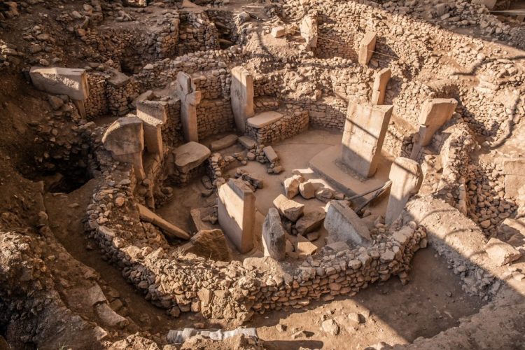 High-quality shot of the beautiful megalithic circle at the center of Gobekli Tepe, filled with pillars. Credit: Shutterstock