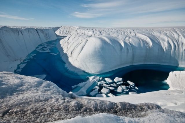 Greenland's kilometer-deep ice cover hides many secrets. Who knows what will be discovered if the ice melts entirely as it has happened in the past. Credit: Ian Joughin, UW APL Polar Science Center