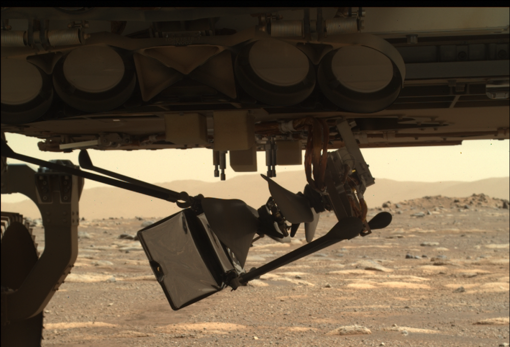 Two of the four legs of the Ingenuity Mars Helicopter have already been released. Credit: NASA / JPL- Caltech