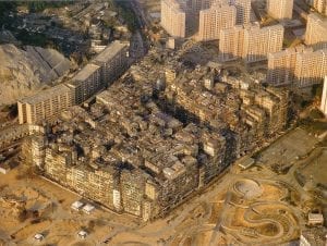 The Kowloon Walled City was the most densely populated place in the world and a city with literally no laws. Credit: Wikimedia Commons
