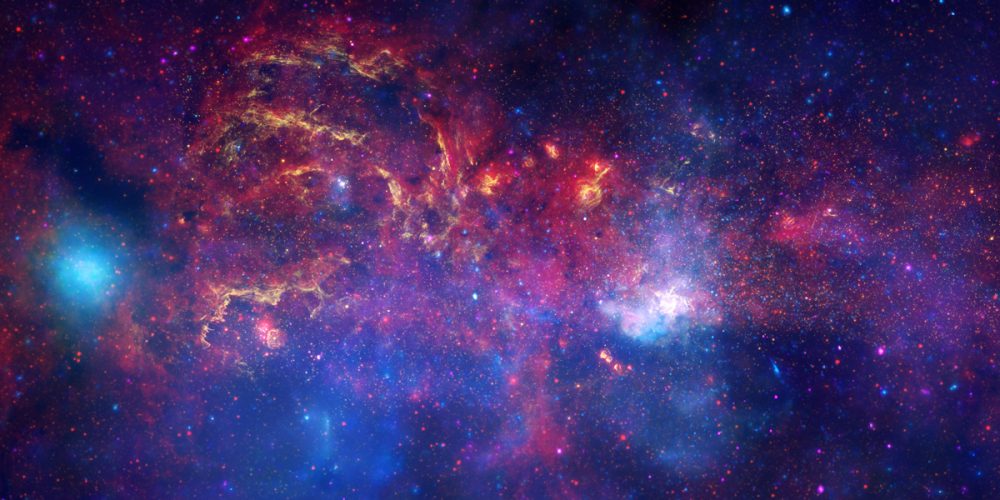 An older composite image of the galactic center. Credit: X-ray: NASA/CXC/UMass/D. Wang et al.; Optical: NASA/ESA/STScI/D.Wang et al.; IR: NASA/JPL-Caltech/SSC/S.Stolovy
