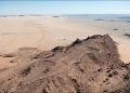 An aerial photograph of a group of several mustatils, created by a mysterious Arabian cult more than 7000 years ago. Credit: AAKSAU