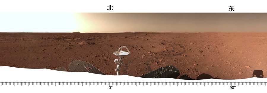 This is a panorama of the surrounding area. on which you can see the landing platform, and a snapshot of the tracks from the rover wheels. It was shared with the new sound recordings from the Zhurong rover on Mars. Credit: CNSA