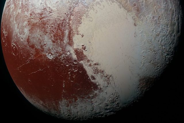 The largest of the red spots on Pluto can be seen on the left - Cthulhu Macula. Credit: NASA/JHUAPL/SwRI