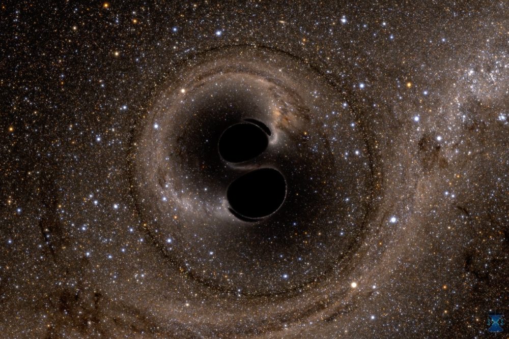 Scientists have confirmed Hawking's theory about black holes. The image is from a computer simulation showing the collision of two black holes that produce gravitational waves. Credit: Simulating eXtreme Spacetimes (SXS) project / Courtesy of LIGO