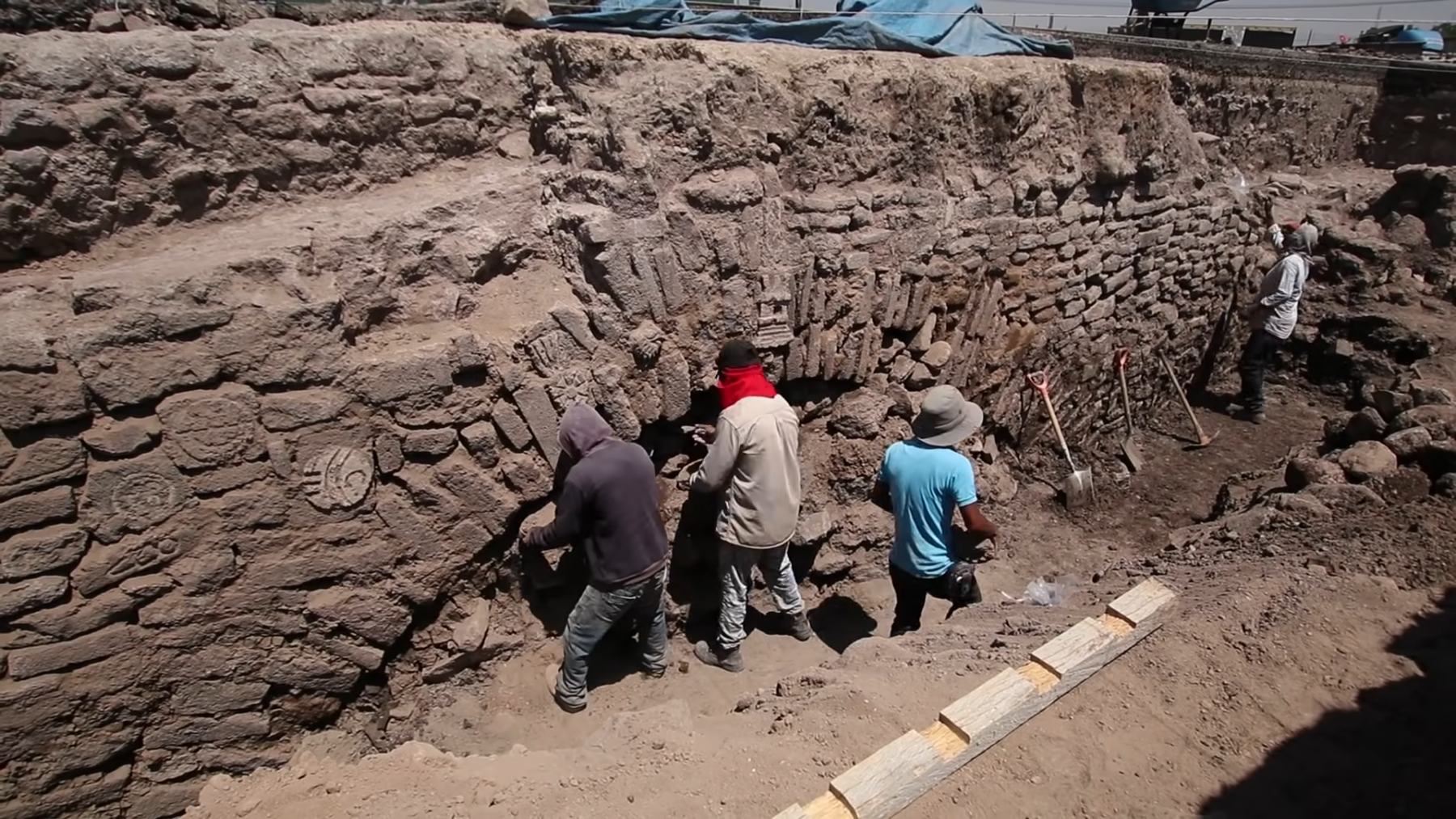 Archaeologists working at the site of the 600-year-old Aztec tunnel. Credit: INAH