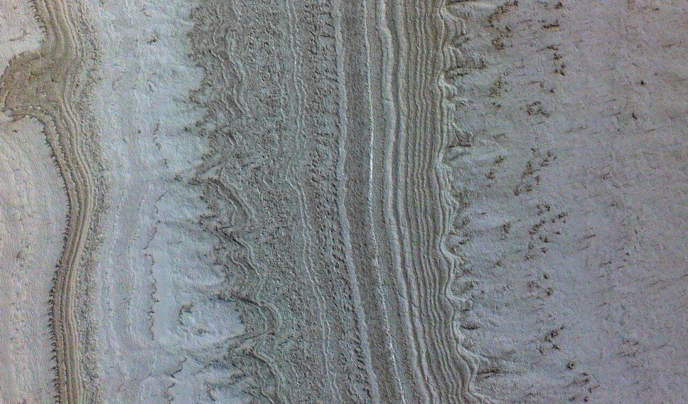 Ice and clay on Mars. Scientists believe that the lakes on Mars may contain huge accumulations of clay. Credit: NASA/JPL-Caltech
