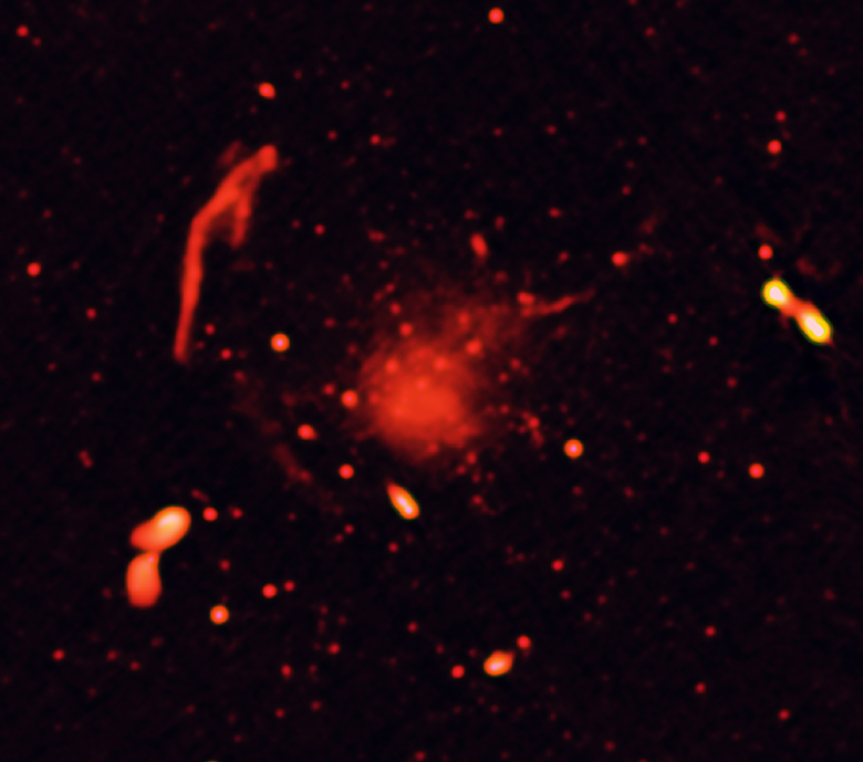 Radio-only image of Abell 2744 in which you see features caused by accelerated particles from collisions between galaxy clusters. Credit: Pearce et al., NRAO/AUI/NSF