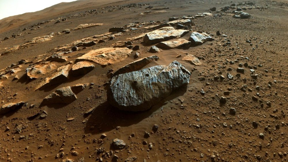This photo, taken by the Perseverence rover, shows the Rochette rock, where the first two holes were drilled to collect Martian samples. To the left is the hole from which the Montagnac sample was taken, and to the right is the hole from which the Montdanier sample was taken. Credit: NASA / JPL-Caltech