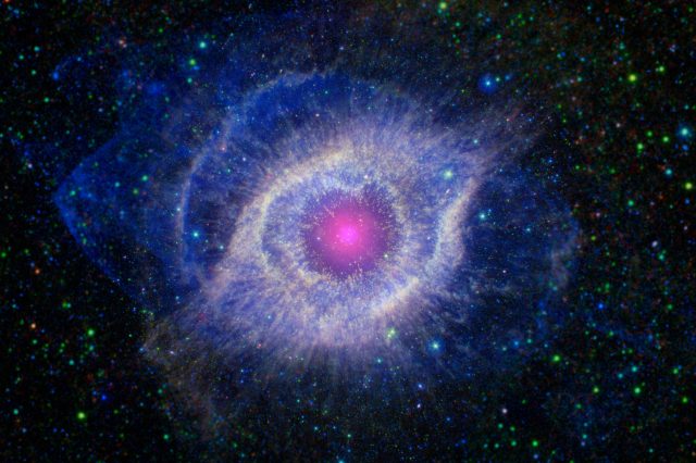 Harvard professor Avi Loeb believes that our universe is an alien lab experiment. On the image: Mixed infrared and ultraviolet view of the Helix Nebula, commonly called the 'Eye of God'. Credit: NASA