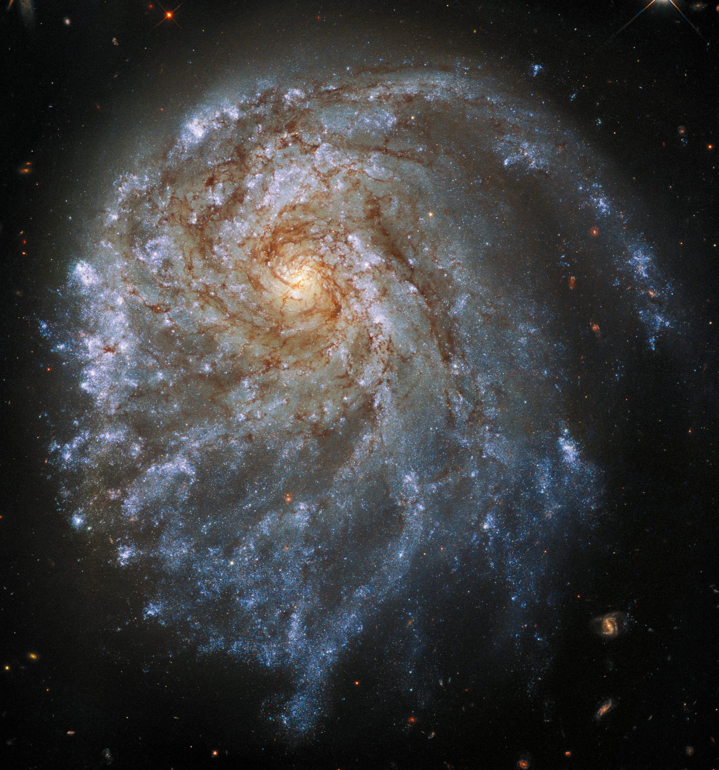 Spiral galaxy NGC 2276, located about 120 million light-years away, photographed here by Hubble and used for the month of July in the calendar. Credit: ESA/Hubble & NASA, P. Sell