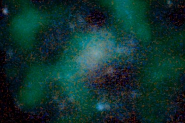 Image of galaxy 114905 which has no dark matter. Neutral hydrogen is in green while the stellar emission is in blue. Credit: J. Román and P. Mancera Piña